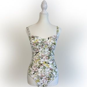 Nip Tuck white color with floral pattern one piece swimsuit. Size 4. Brand new.